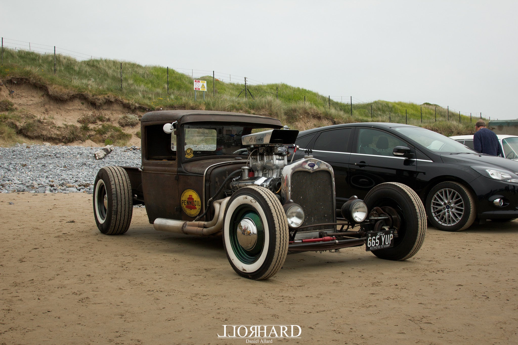 Rods on the beach: Pendine Sands.